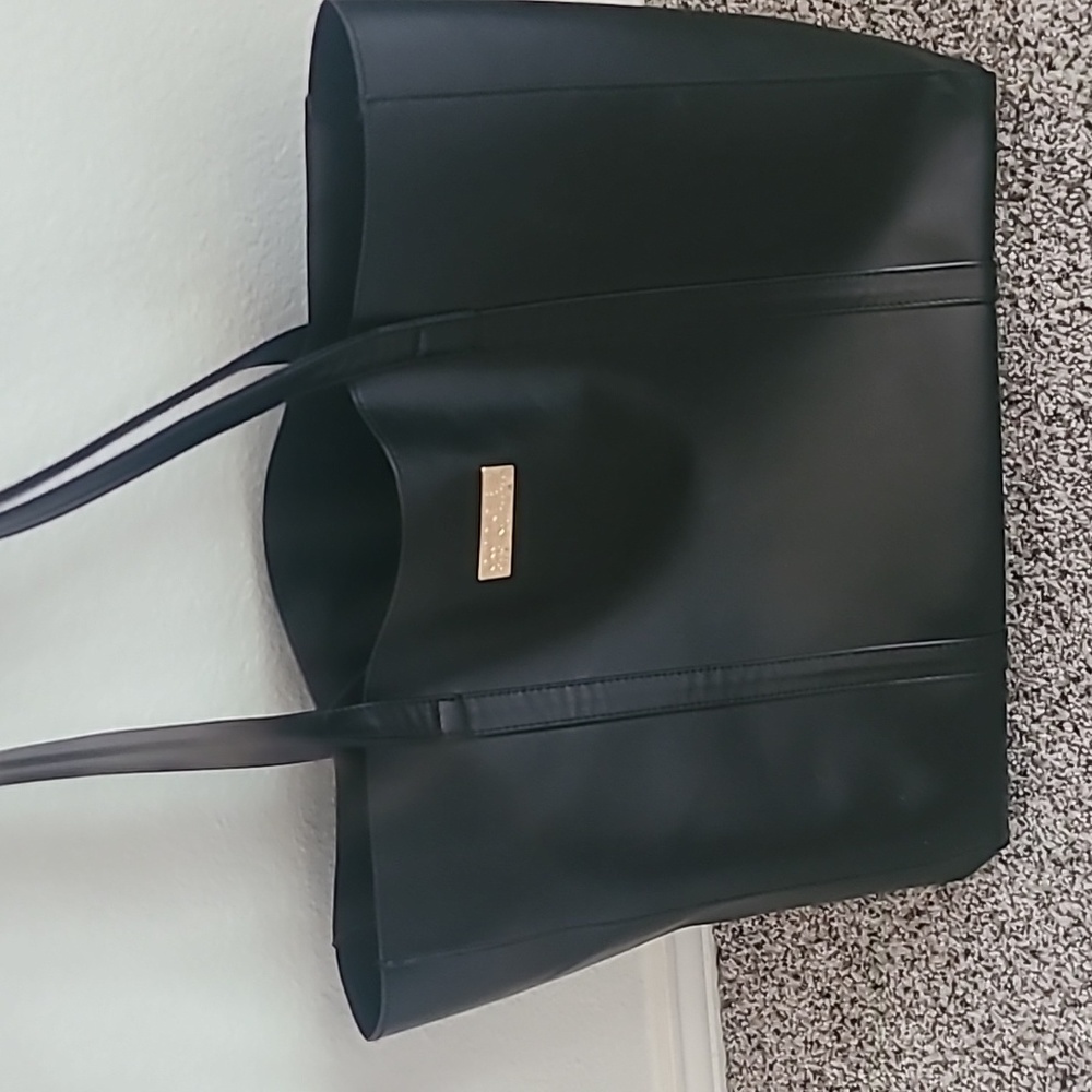 Good Girl Carolina Herrera black tote.